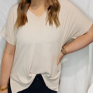 women’s tan short sleeve top. (never worn)